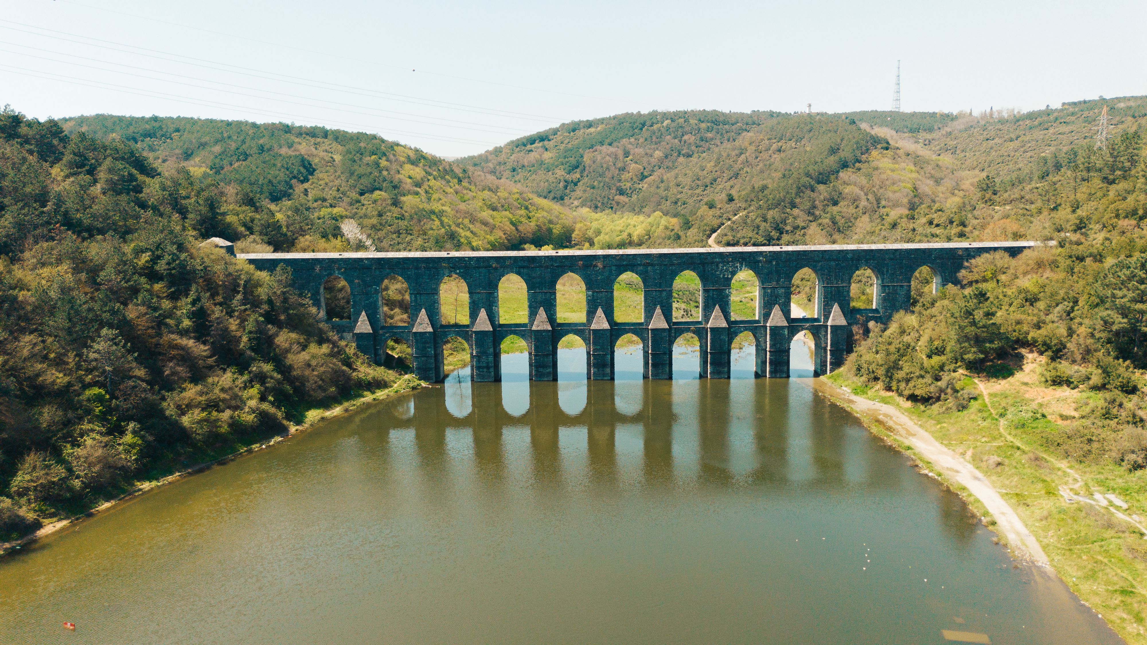 Aerial View of Historic Arched Aqueduct · Free Stock Photo