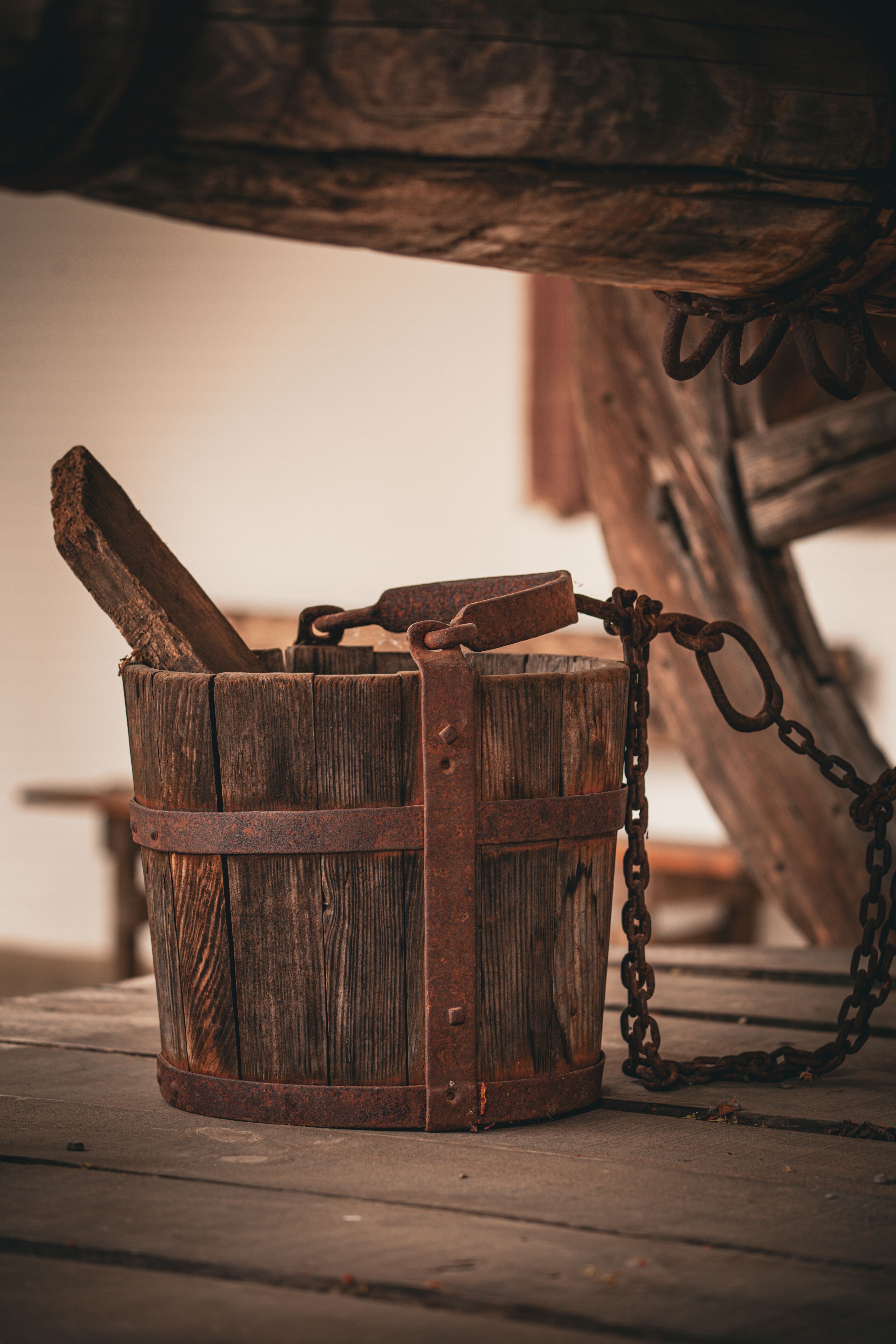 Rustic Wooden Bucket and Chain on Wooden Floor · Free Stock Photo
