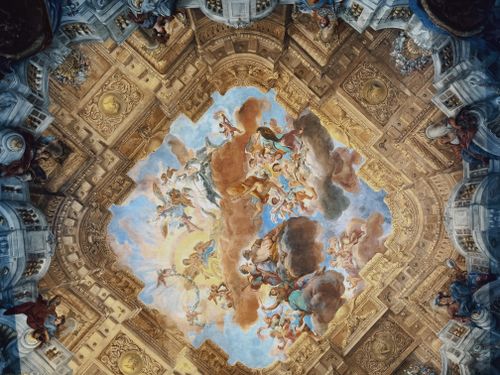 Free A stunning Baroque fresco depicting mythological figures ascending in a dramatic celestial scene. Stock Photo