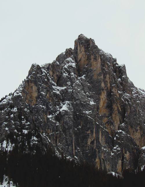 Free Stunning view of snow-covered rocky peaks in Trentino-Alto Adige, Italy. Stock Photo