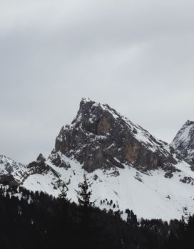 Majestic snow-covered mountains in the Dolomites, Trentino-Alto Adige, capture winter's beauty. 37455407