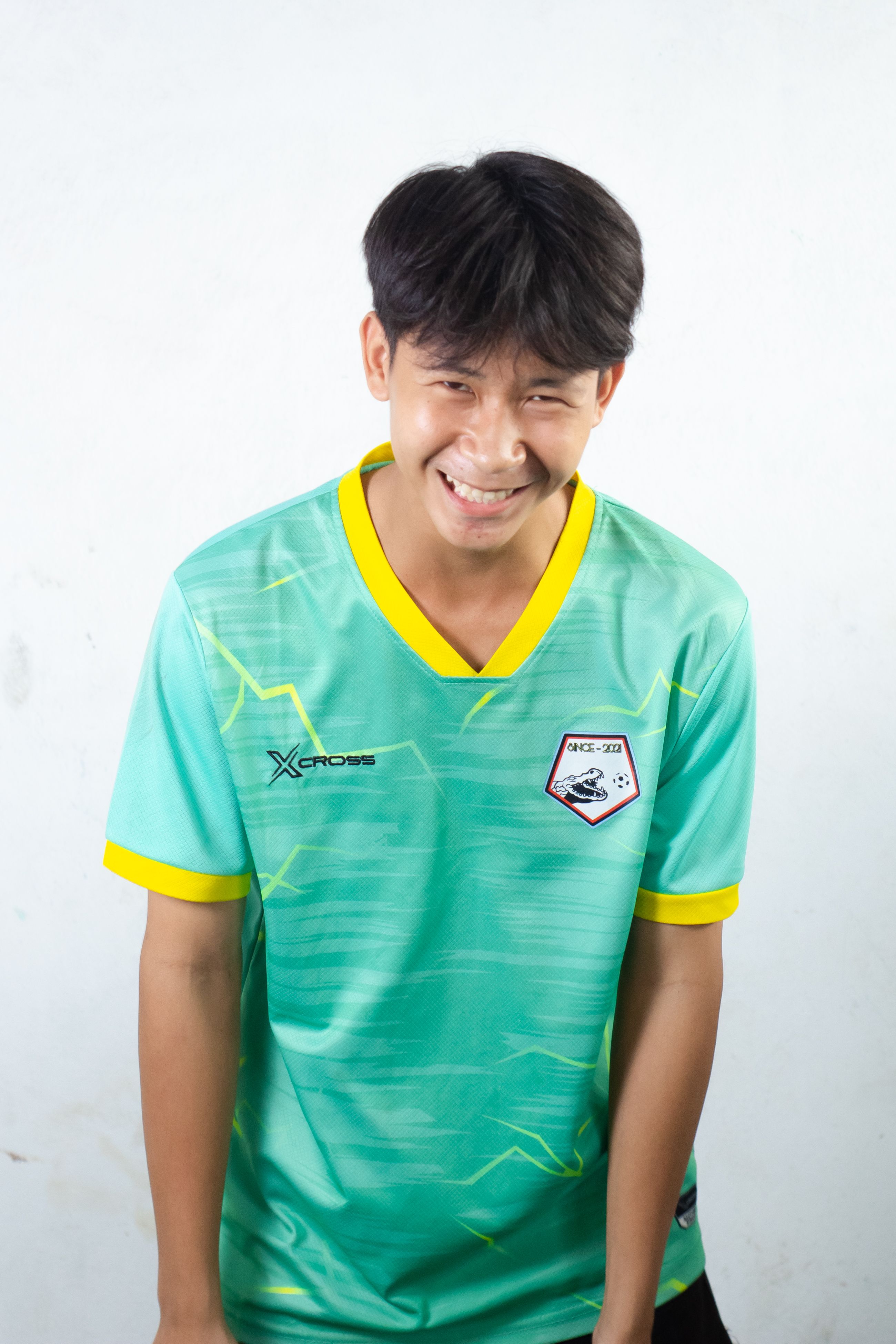 Smiling Young Man in Sports Jersey Portrait