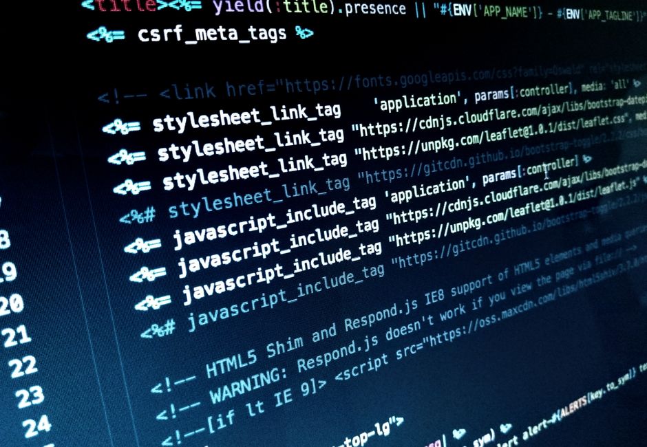 Detailed view of HTML and JavaScript code displayed on a computer monitor.
