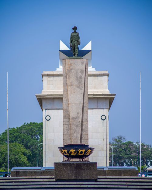 Free The Independence Arch in Accra, a symbol of Ghana's freedom, under a bright blue sky. Stock Photo