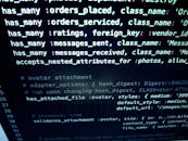 计算机屏幕上的特写图像展示了详细的编程代码，非常适合与技术相关的主题