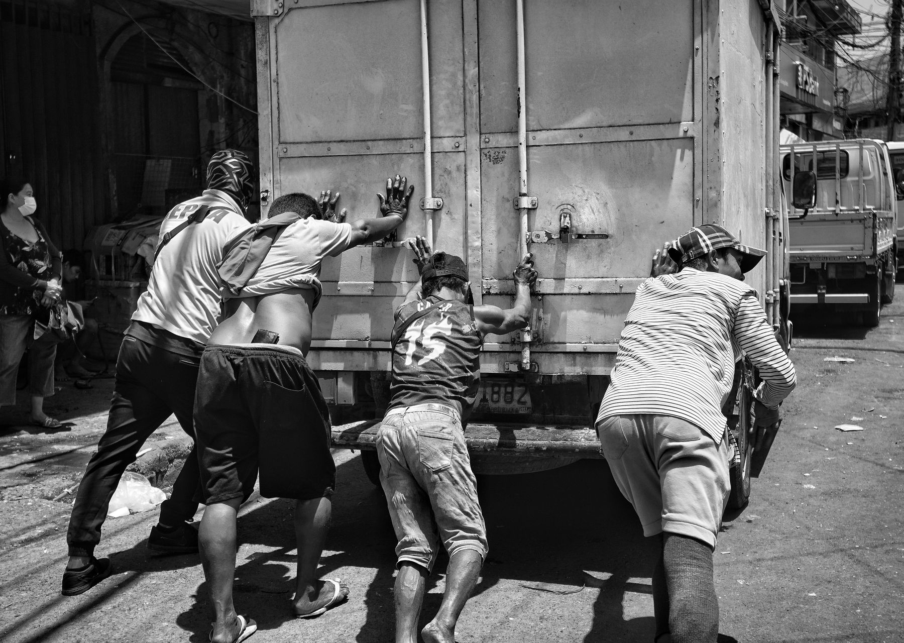 House removals in Birmingham — crew wrapping and loading on moving day