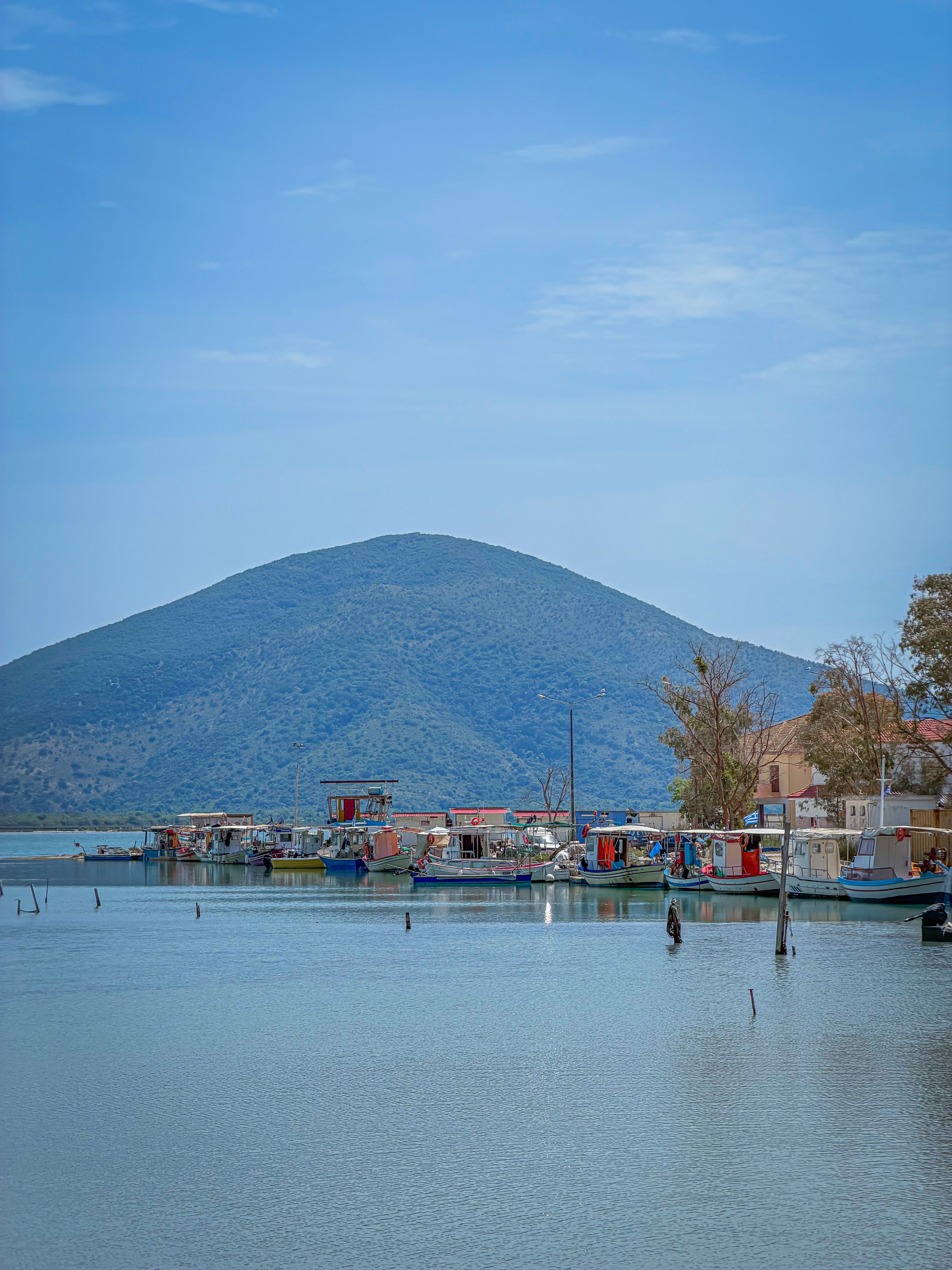 Scenic Coastal Village with Mountain View · Free Stock Photo