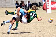 2 Men Running on Field