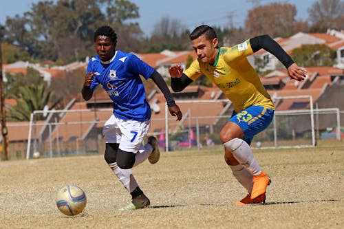 Men Playing Football