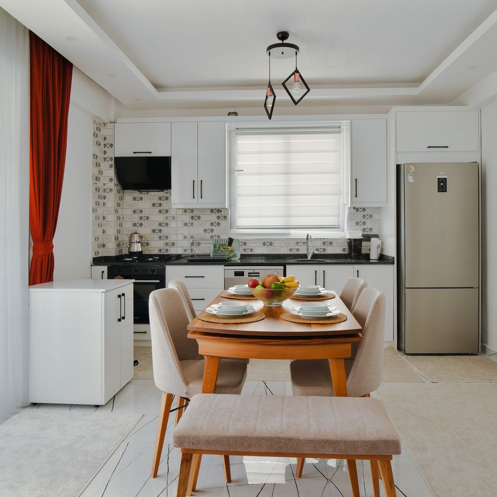 Kitchen Spraying in Tokyngton — surfaces prepped and cut in by hand