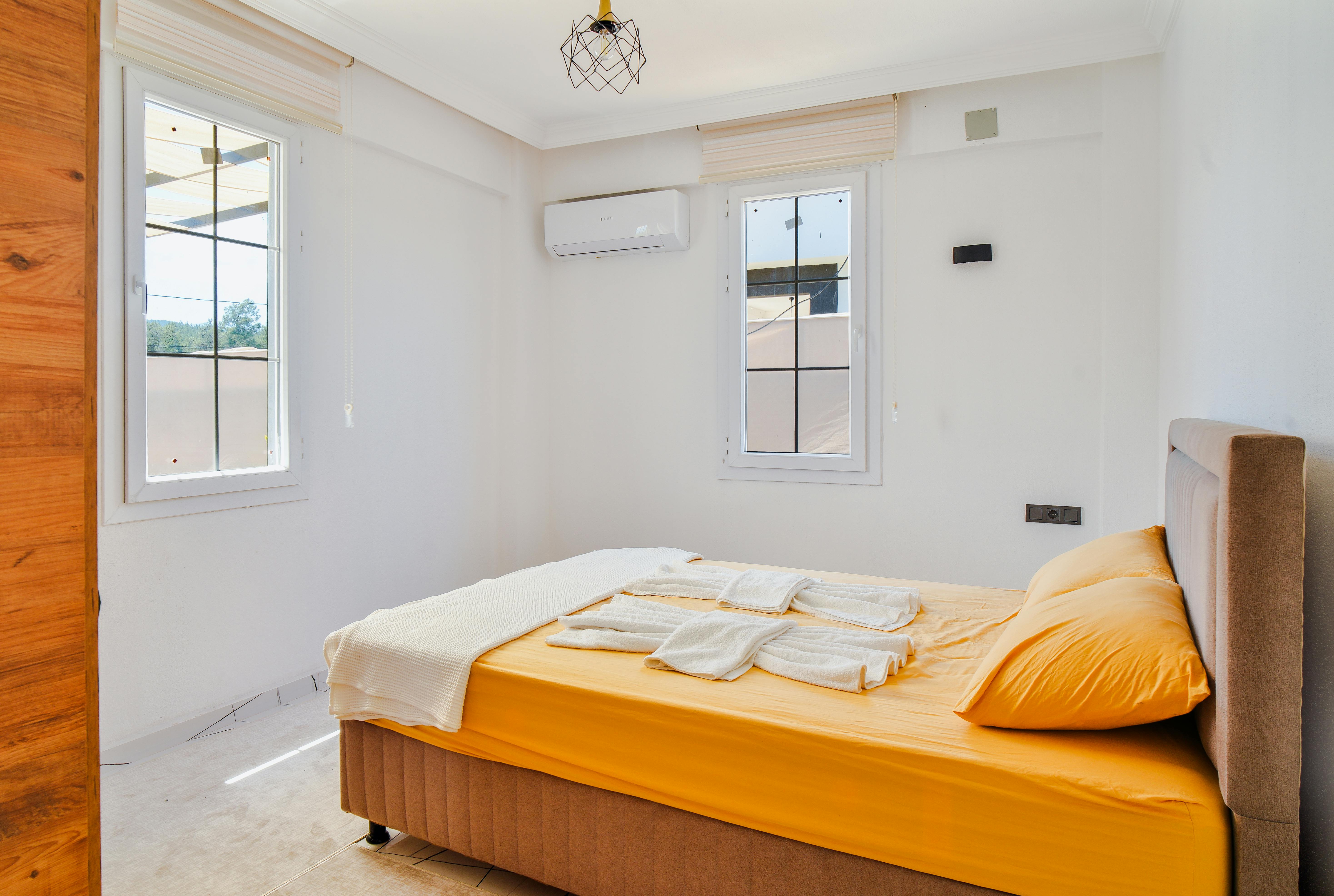 The air in your bedroom may be quietly harming your sleep and recovery — Photo by UMUT   🆁🅰🆆 on Pexels