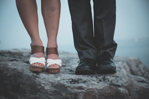 Free Closeup Photo of Two Person's Legs Stock Photo