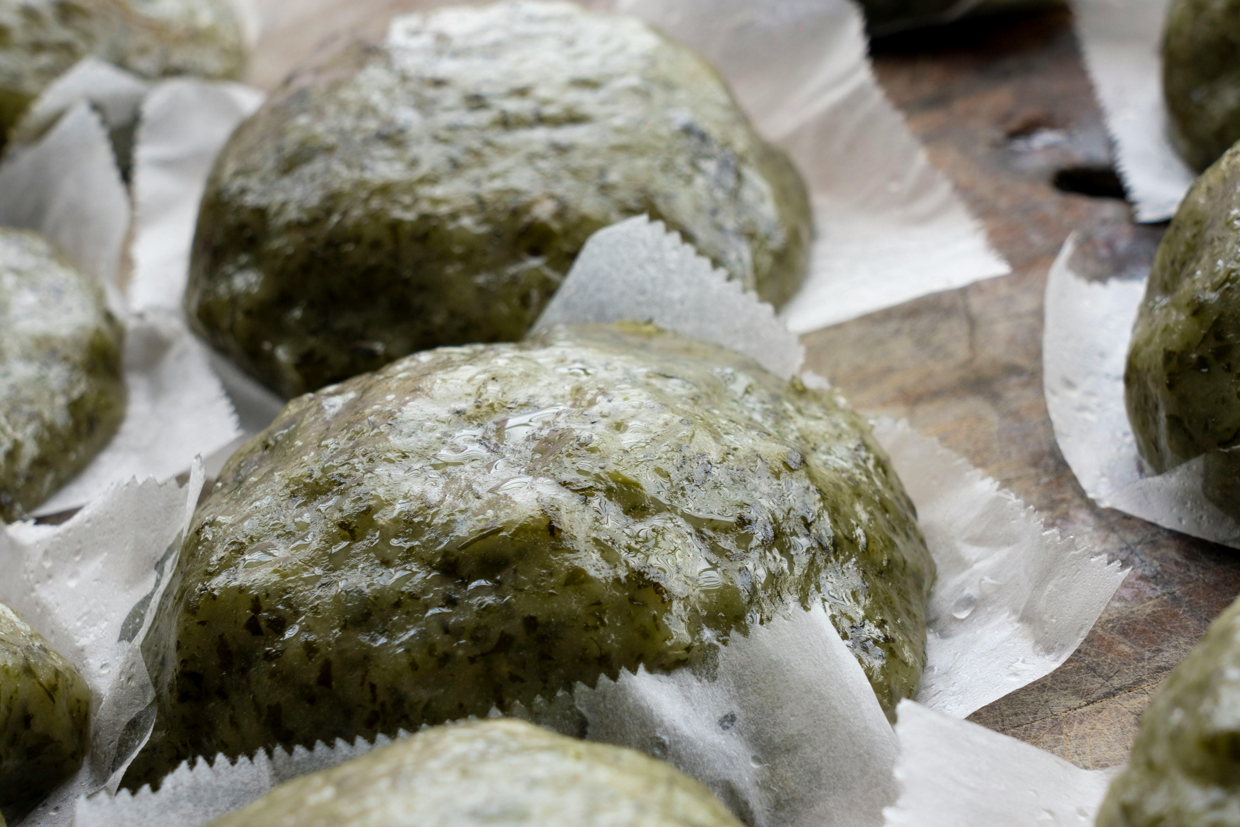 Authentic Taiwanese Qingtuan rice cake made with wormwood, captured up close in Taipei.