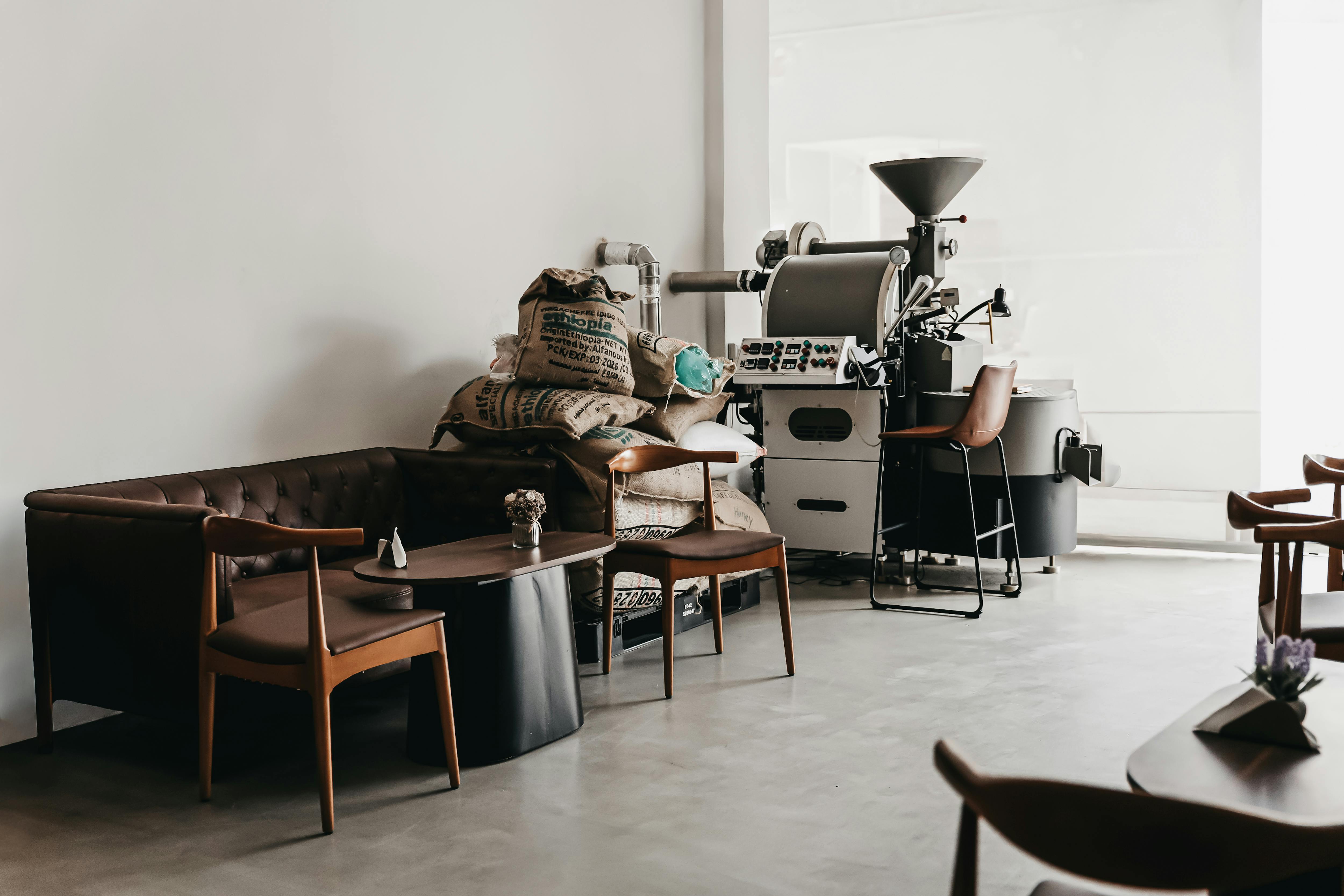 Bunker Company Apgujeong in-house roastery counter with industrial concrete interior and espresso machine