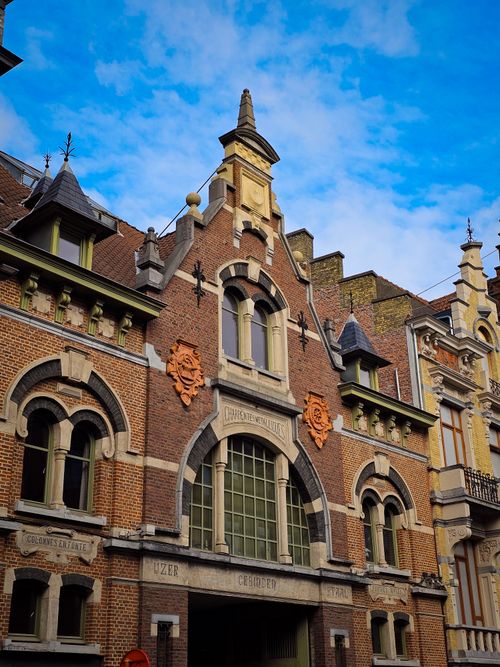 Free Stunning view of a historic Flemish building under a clear blue sky in Brugge, Belgium. Stock Photo