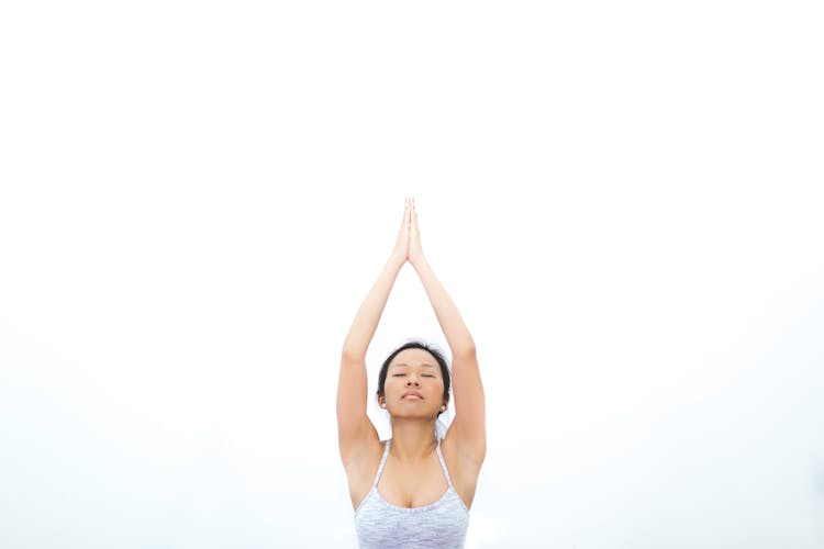 Woman Raising Two Hands