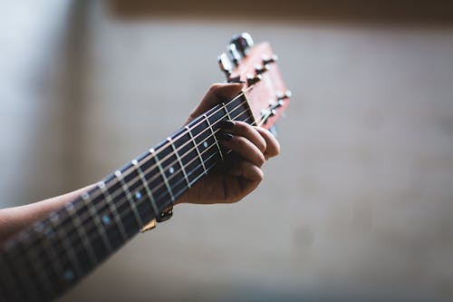 Free Person Playing Guitar Stock Photo
