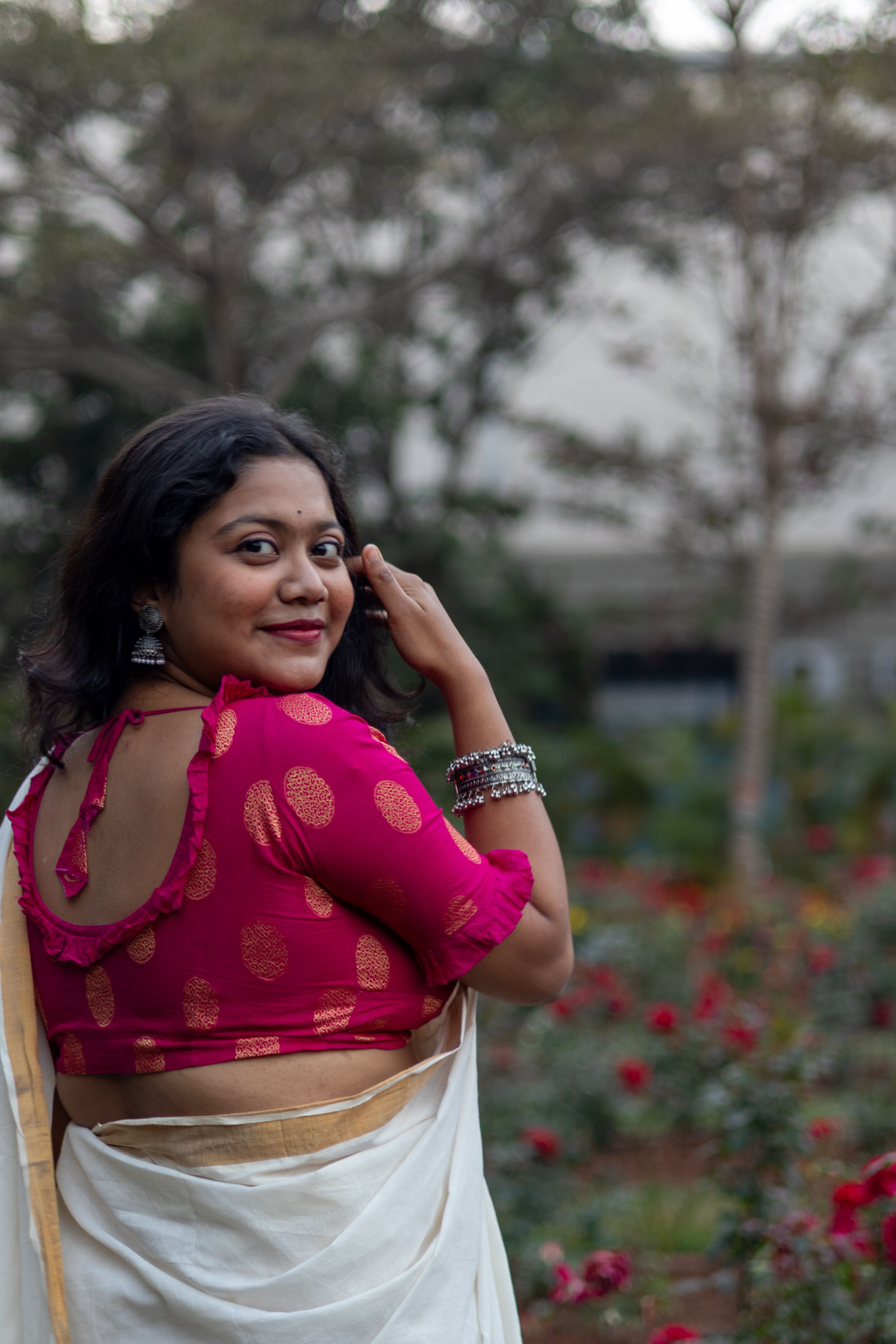 Elegant Woman in Traditional Indian Saree Outdoors · Free Stock Photo