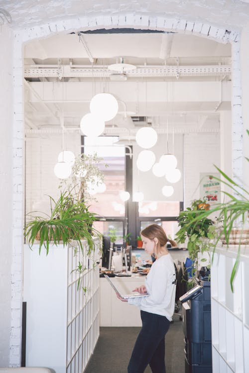 Woman Standing in Office