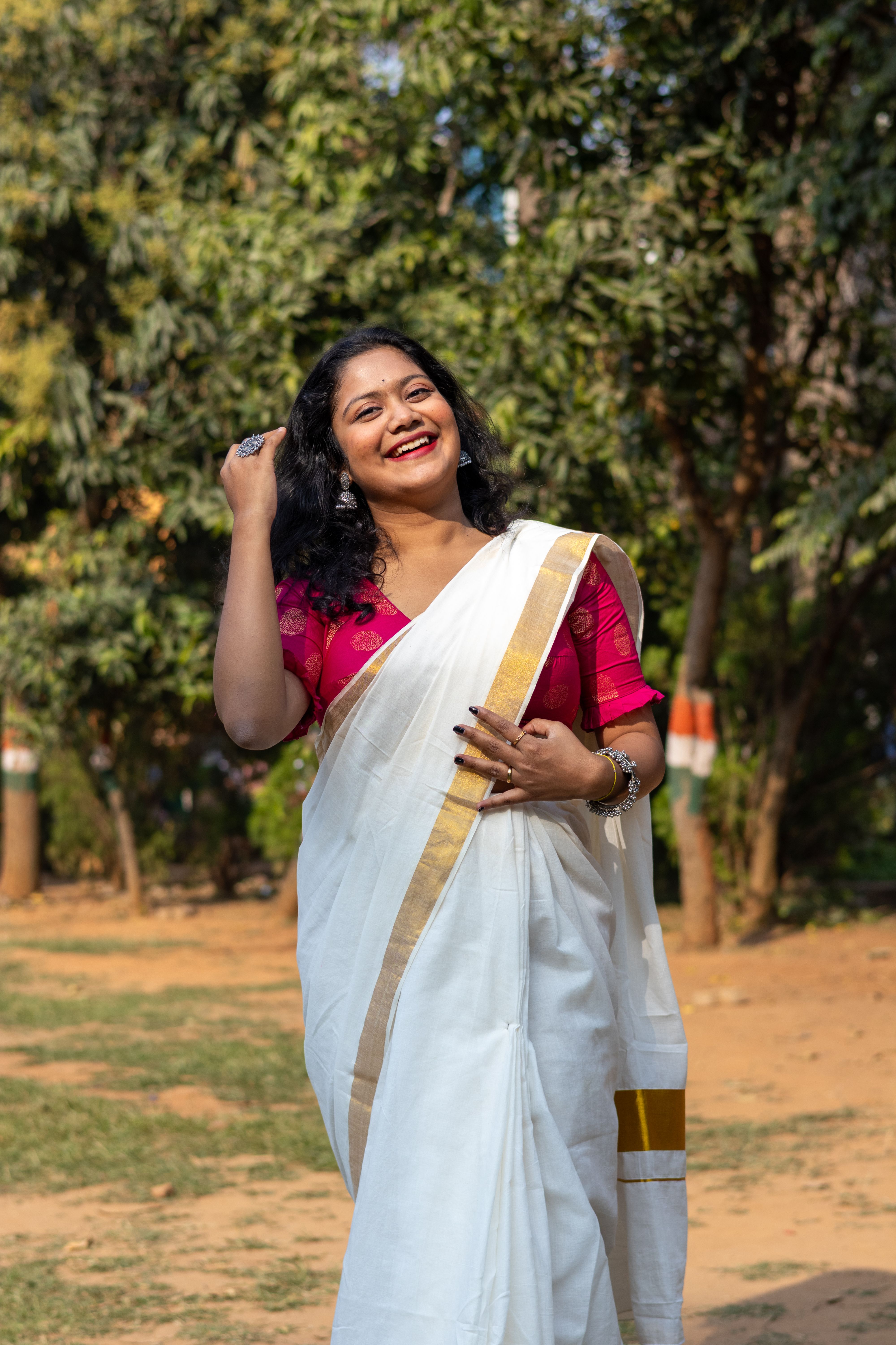 Elegant Indian Woman in Traditional Saree Outdoors · Free Stock Photo