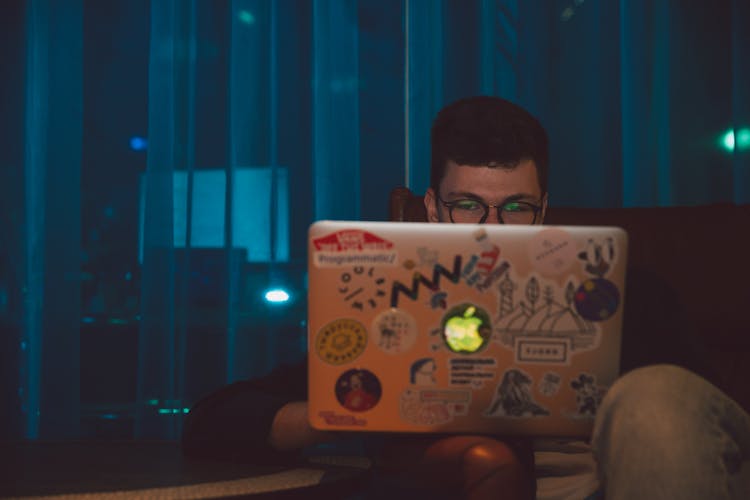 Photo Of Man Using Laptop