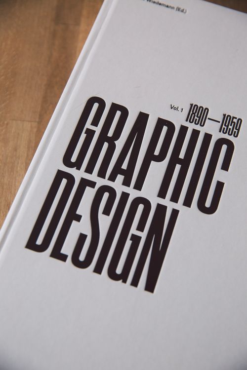 Free Close-up of a graphic design book cover highlighting years 1890-1959. Stock Photo