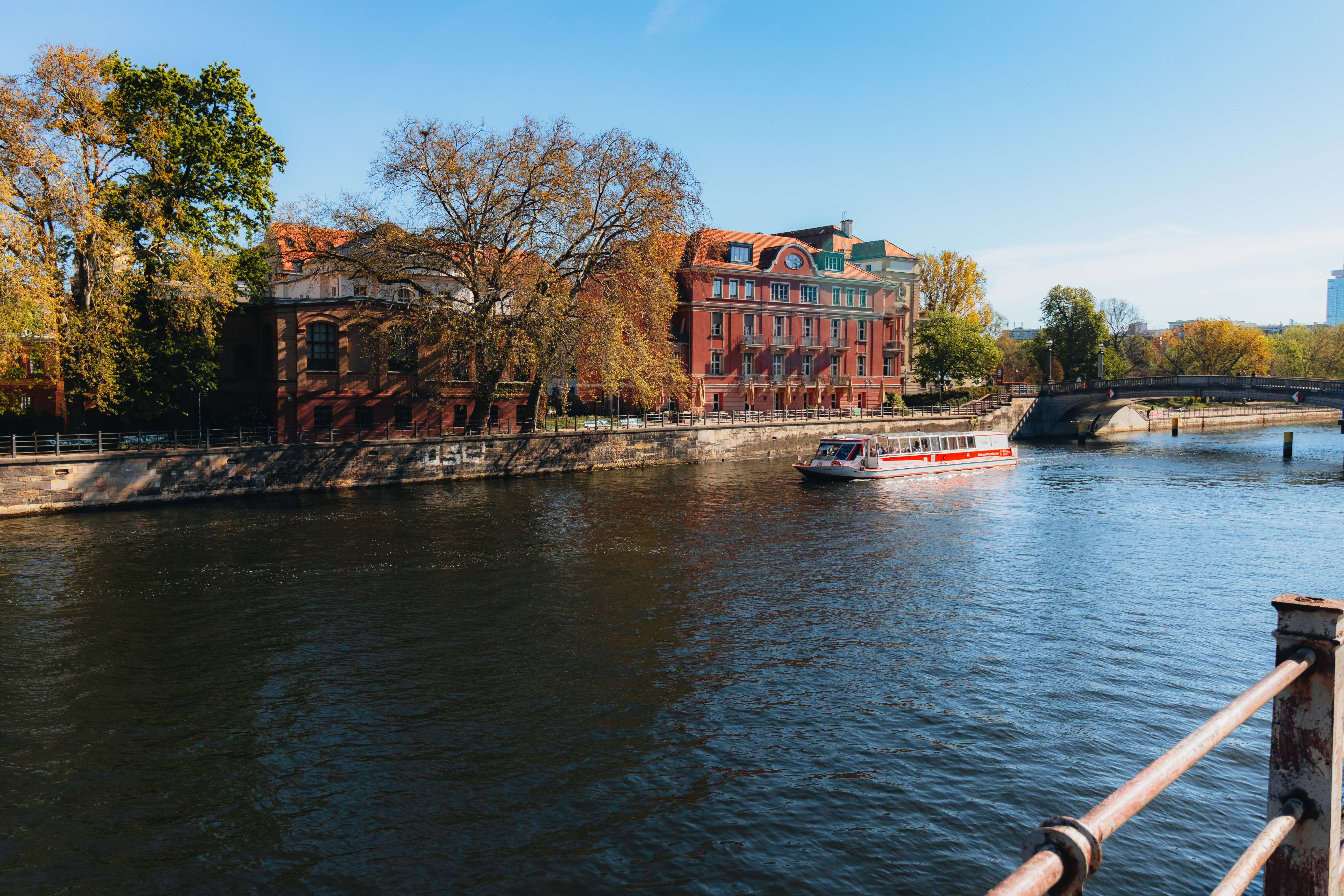 Tour boat cruising the Spree River in Berlin with historic buildings — Kreuzberg multicultural + Turkish Berlin + 1971 Hasir döner kebab birthplace