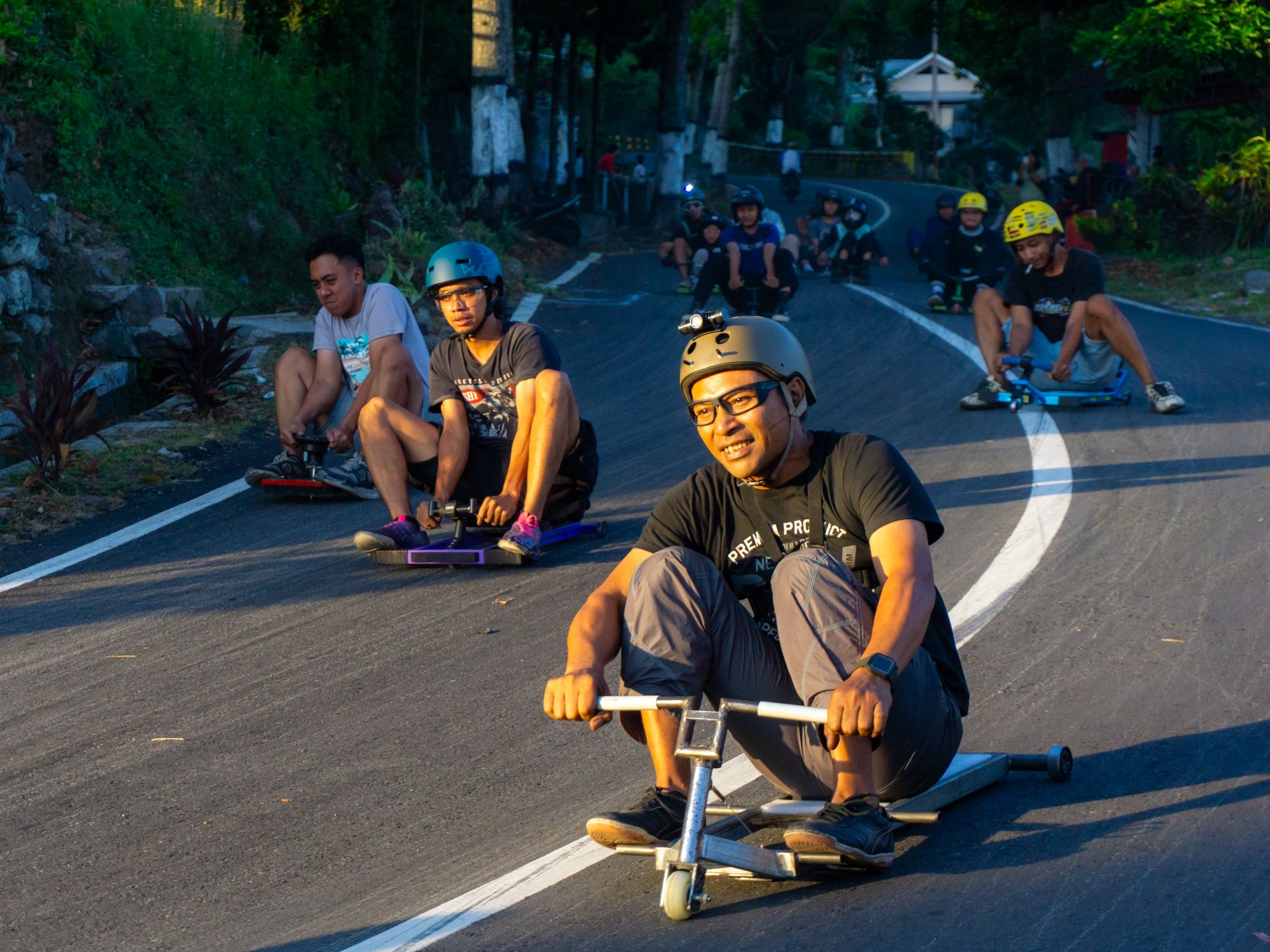 Group of Friends Enjoying Downhill Racing in Jawa Timur · Free Stock Photo