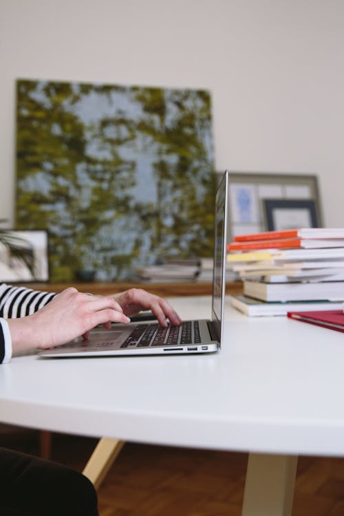 Photo Of Person Using Laptop 