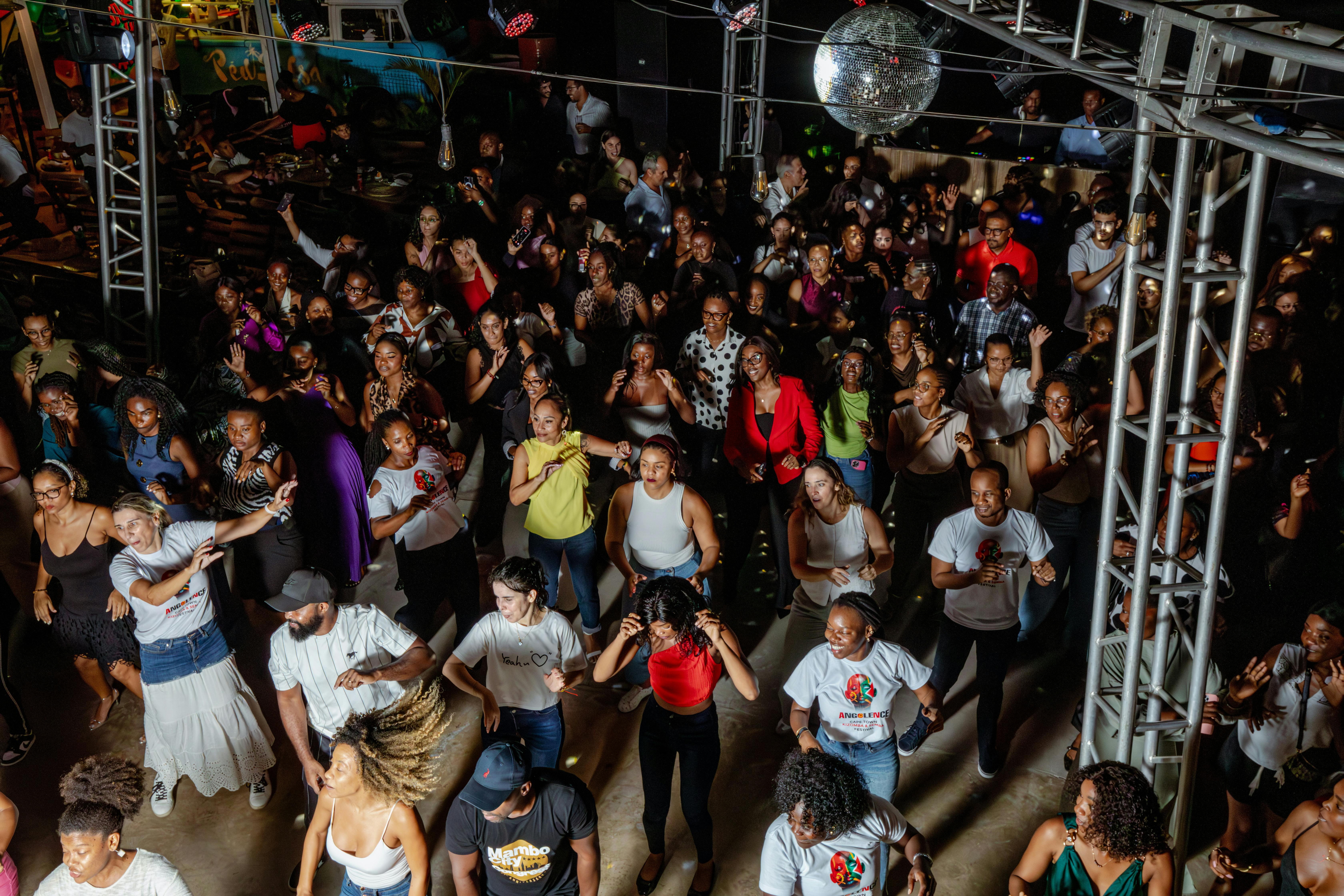 Outdoor festival with vendor booths and crowd