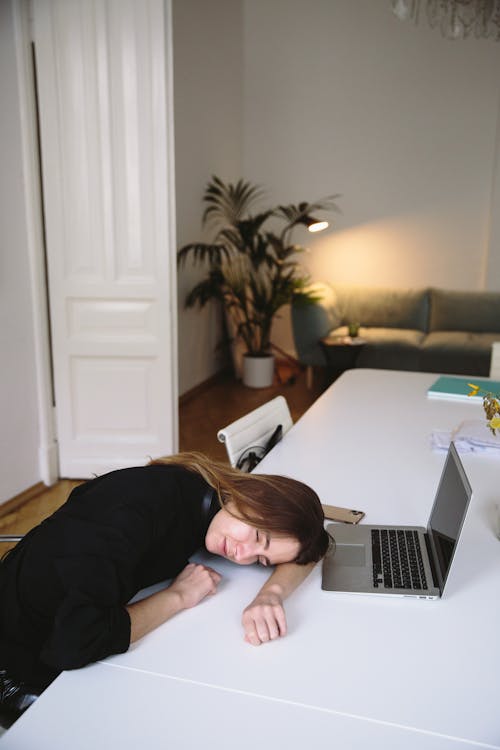 Free Photo Of Woman Sleeping On Table Stock Photo