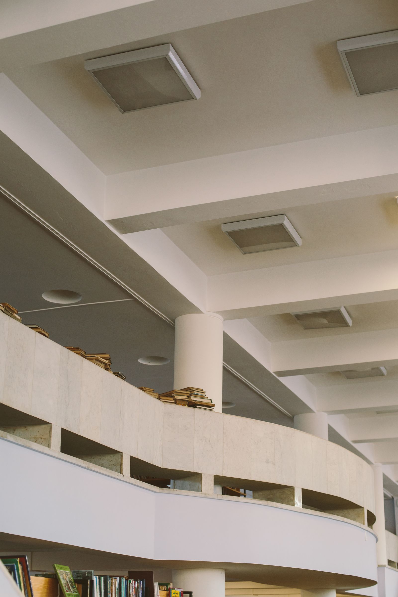 Layered library interior suggesting continuity and structured planning