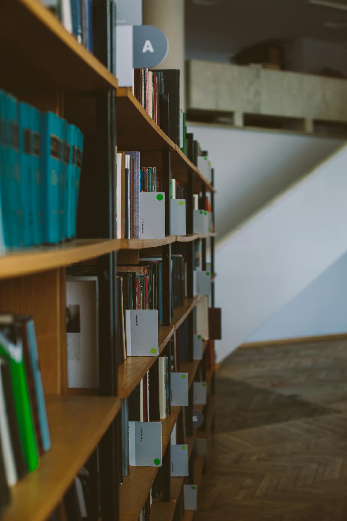 Minimal aesthetic study desk with laptop and mechanical keyboard under warm lighting
