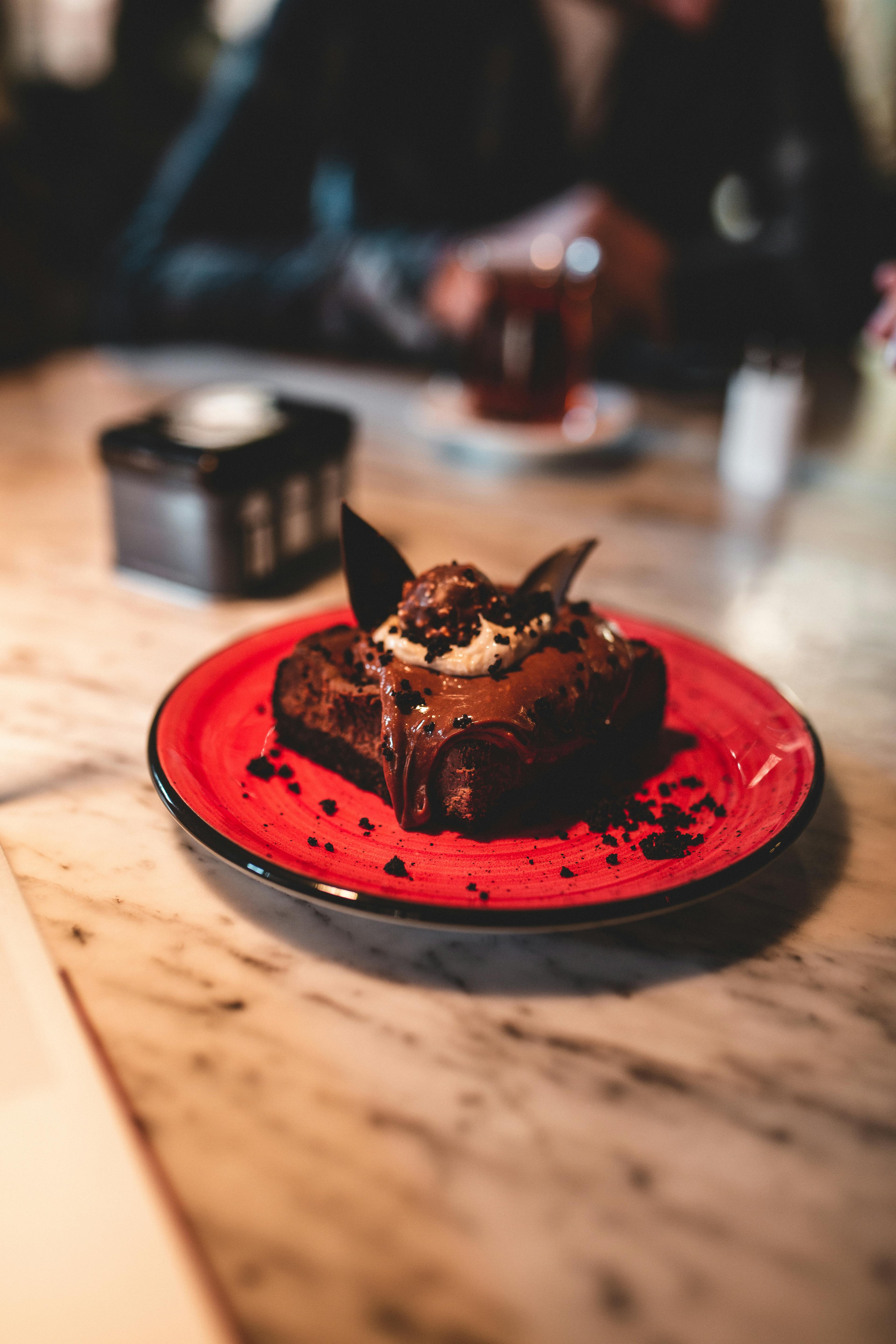 Minimalist desk with warm lighting, laptop, and notebook creating a calm study atmosphere