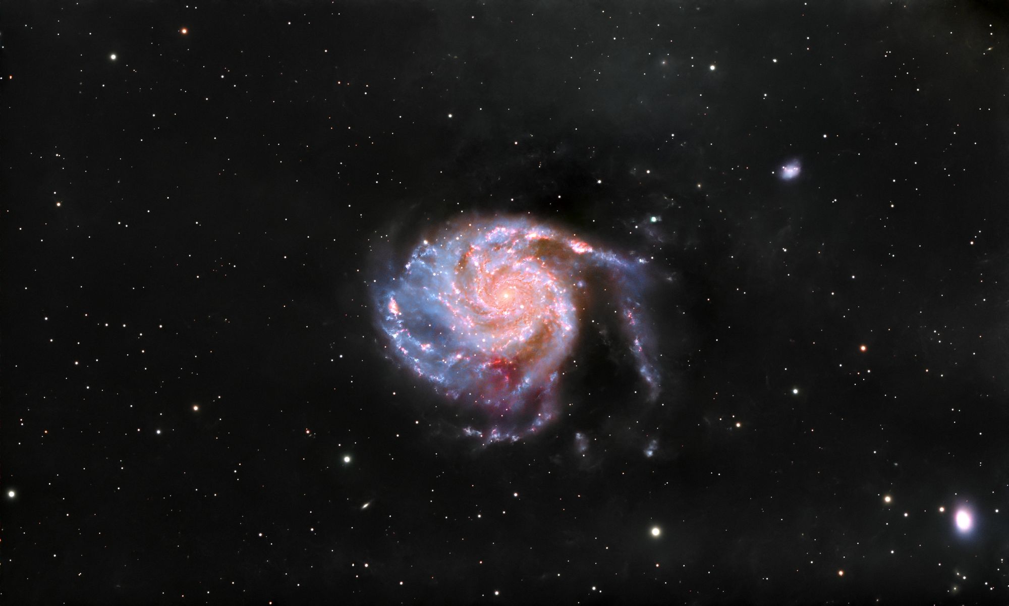 Captivating view of a spiral galaxy amidst stars in the vast universe.