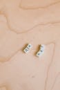 Photo Of Alphabet Tiles On Wooden Surface