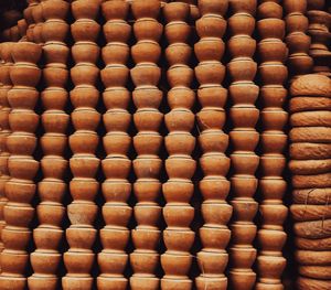 Stacked terracotta pots by Avro Dutta on Pexels