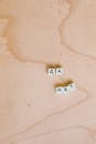 Photo Of Alphabet Tiles On Wooden Surface