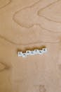 Photo Of Scrabble Pieces On Wooden Surface