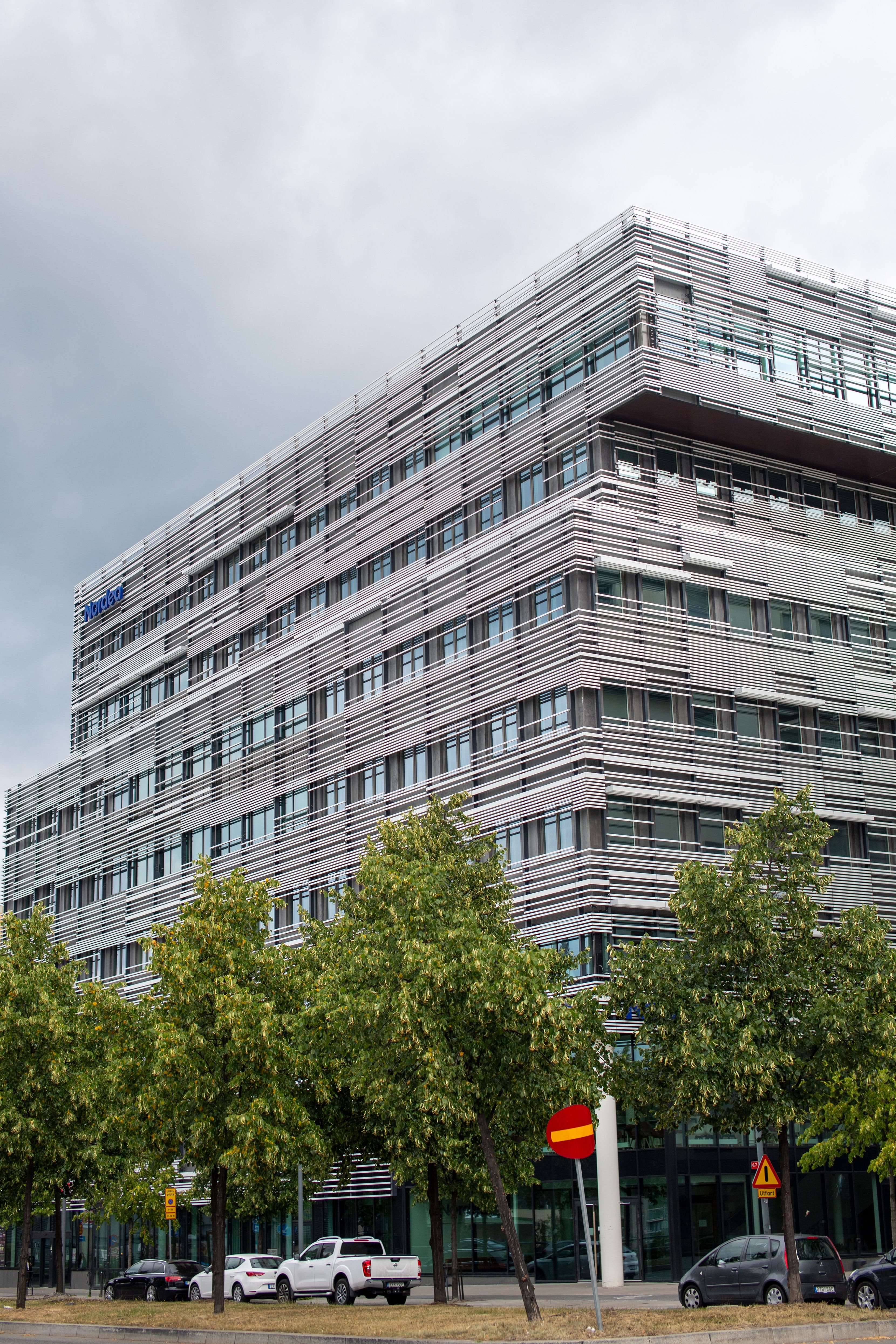 Contemporary office building exterior in Stockholm with modern architecture and glass facade.
