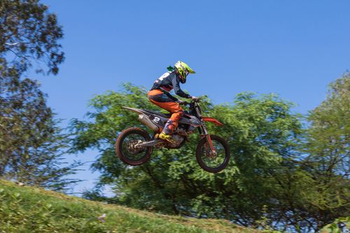 Free A motocross rider performs an exhilarating jump in an outdoor competition. Stock Photo