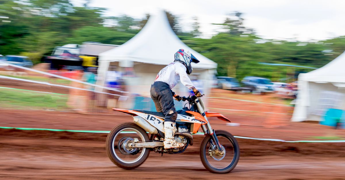 Slow Motorcross Rider Exciting Motorcross Rider in Action at Event · Free Stock Photo