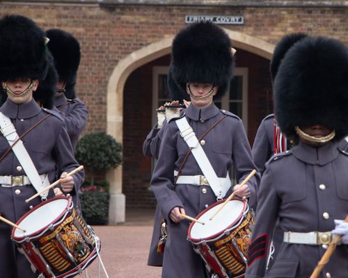 Free Guards in traditional attire perform at a London changing of the guard ceremony. Stock Photo