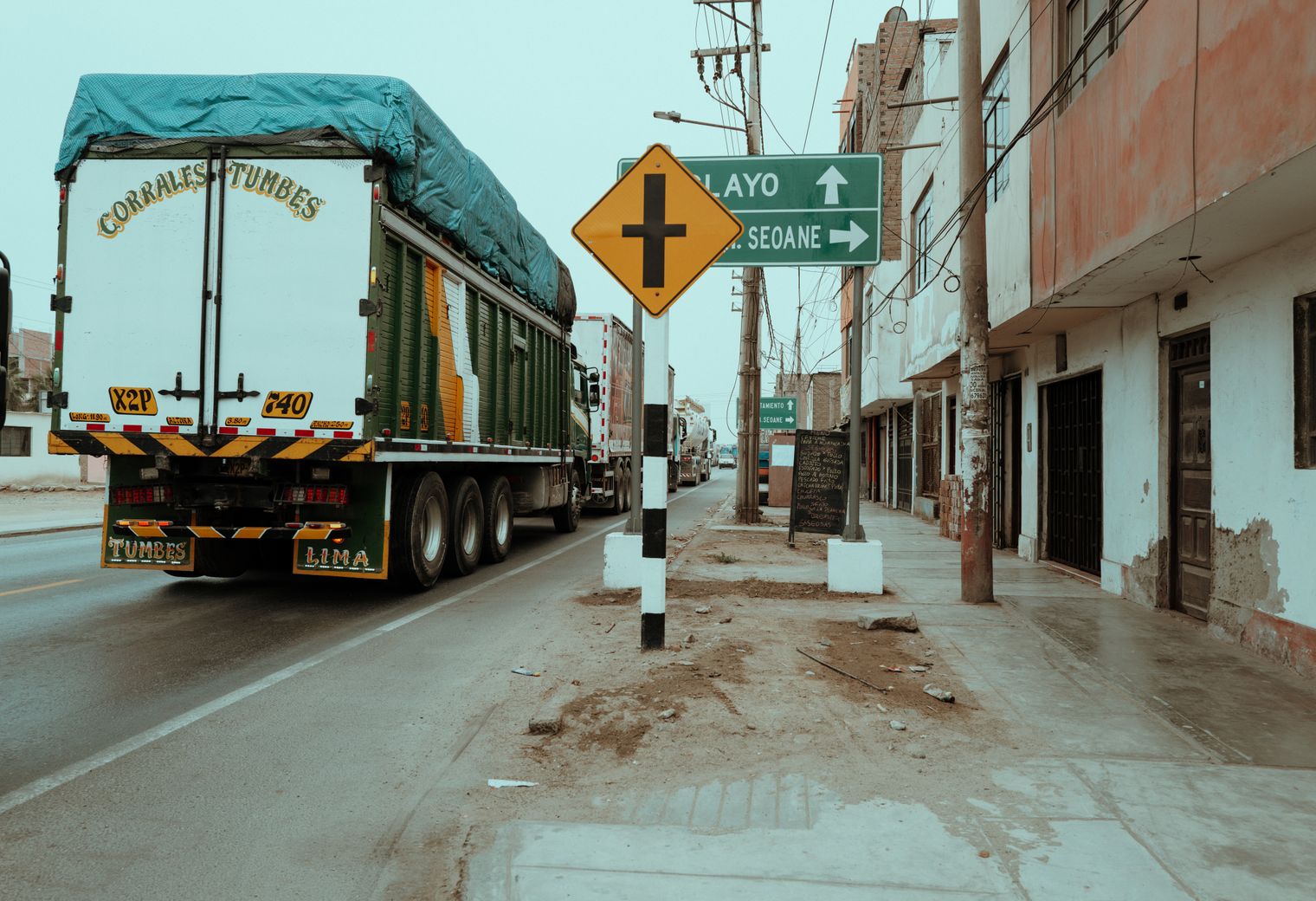 Mayfair — movers delivering furniture from a van