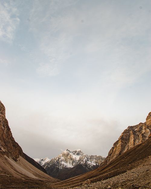 Free Breathtaking view of snow-capped peaks in Zanskar Valley during daytime, capturing nature's grandeur. Stock Photo