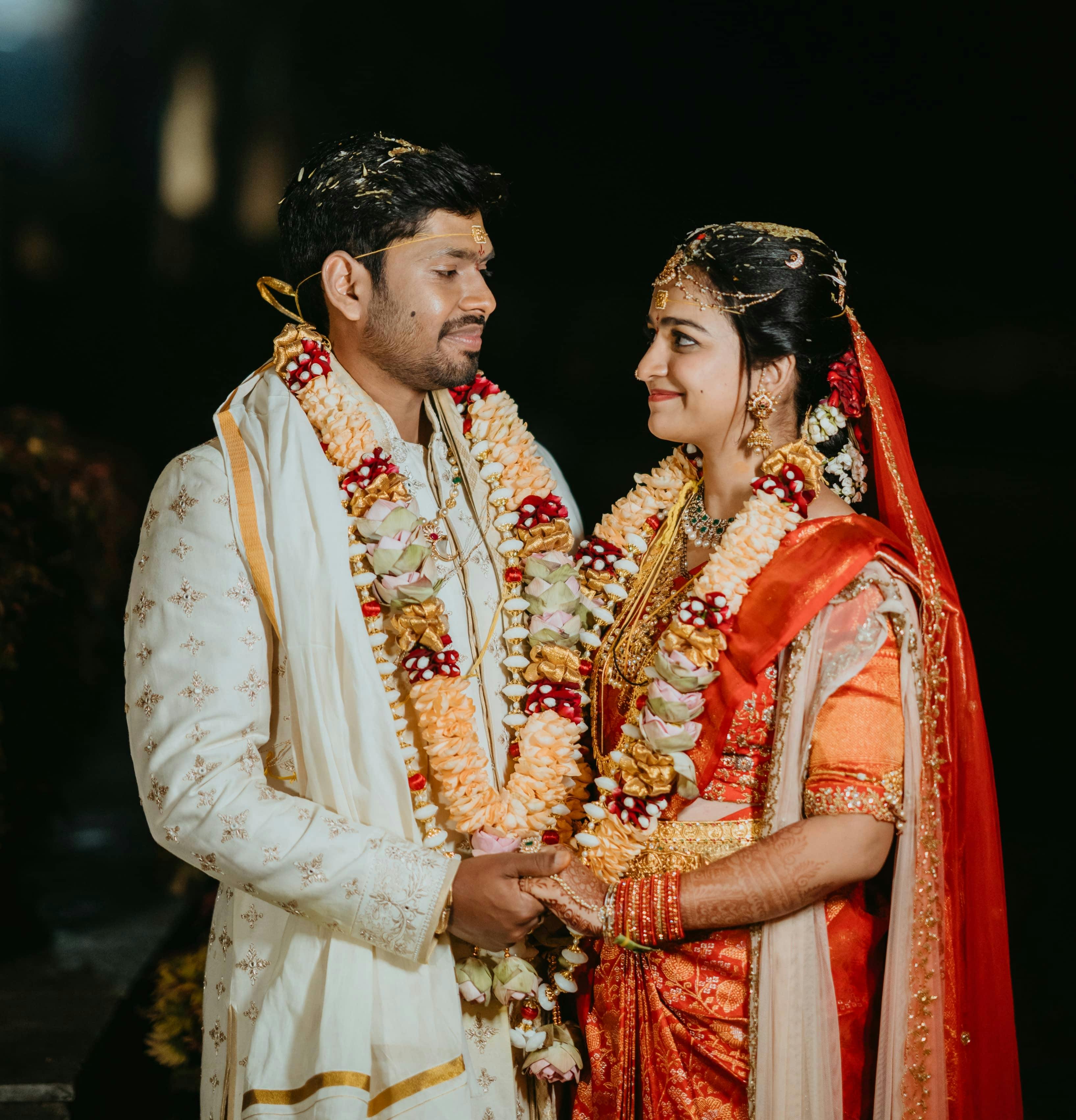 Couple in traditional attire during an Indian wedding ceremony in Hyderabad.
