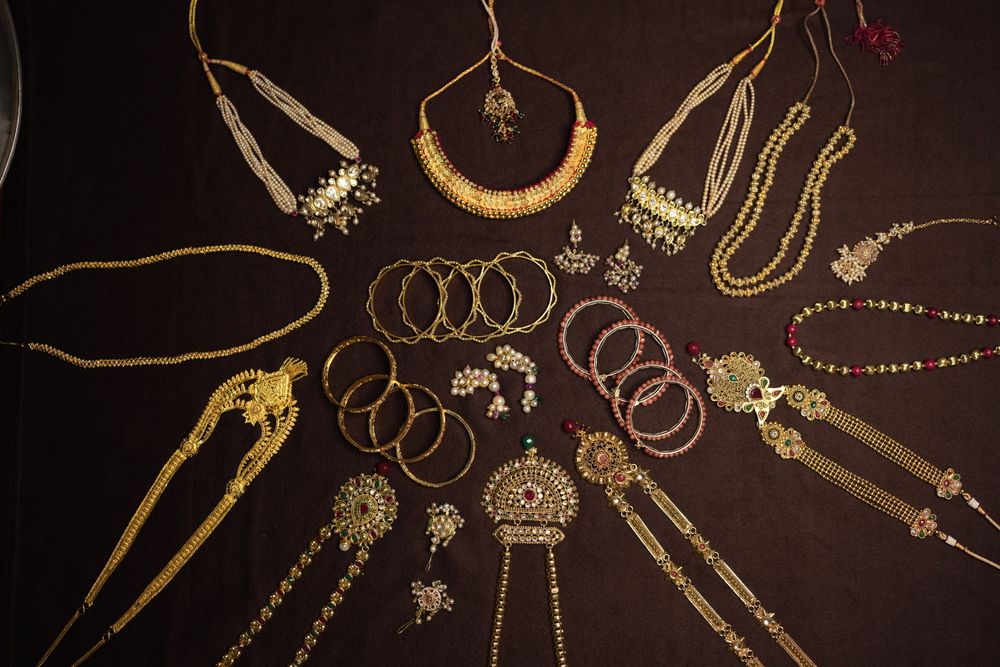 Exquisite display of traditional Indian gold necklaces, bangles, and earrings