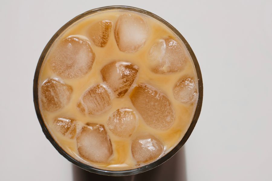 Iced chai in a glass over ice