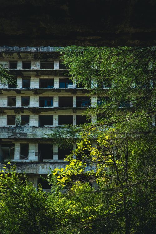 Free Explore the haunting beauty of the abandoned sanatorium amidst lush greenery in Tskaltubo, Georgia. Stock Photo