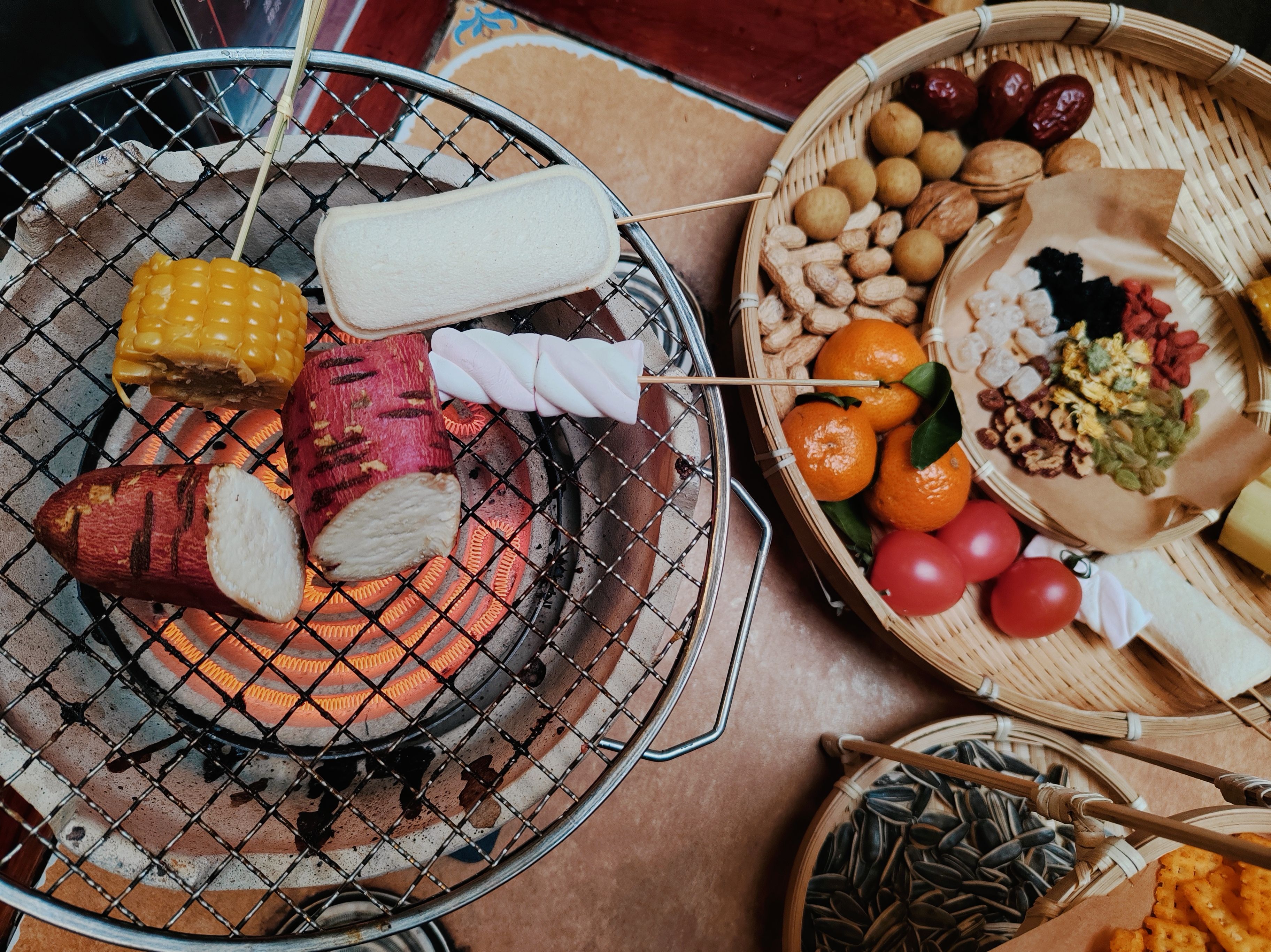 Delicious grilled seafood prepared in a rolling grill basket with fresh herbs